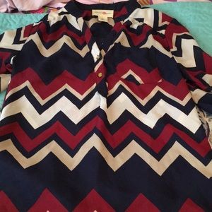 A formal multicolored chevron printed blouse